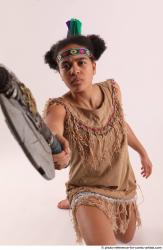 ANISE KNEELING POSE WITH AX 